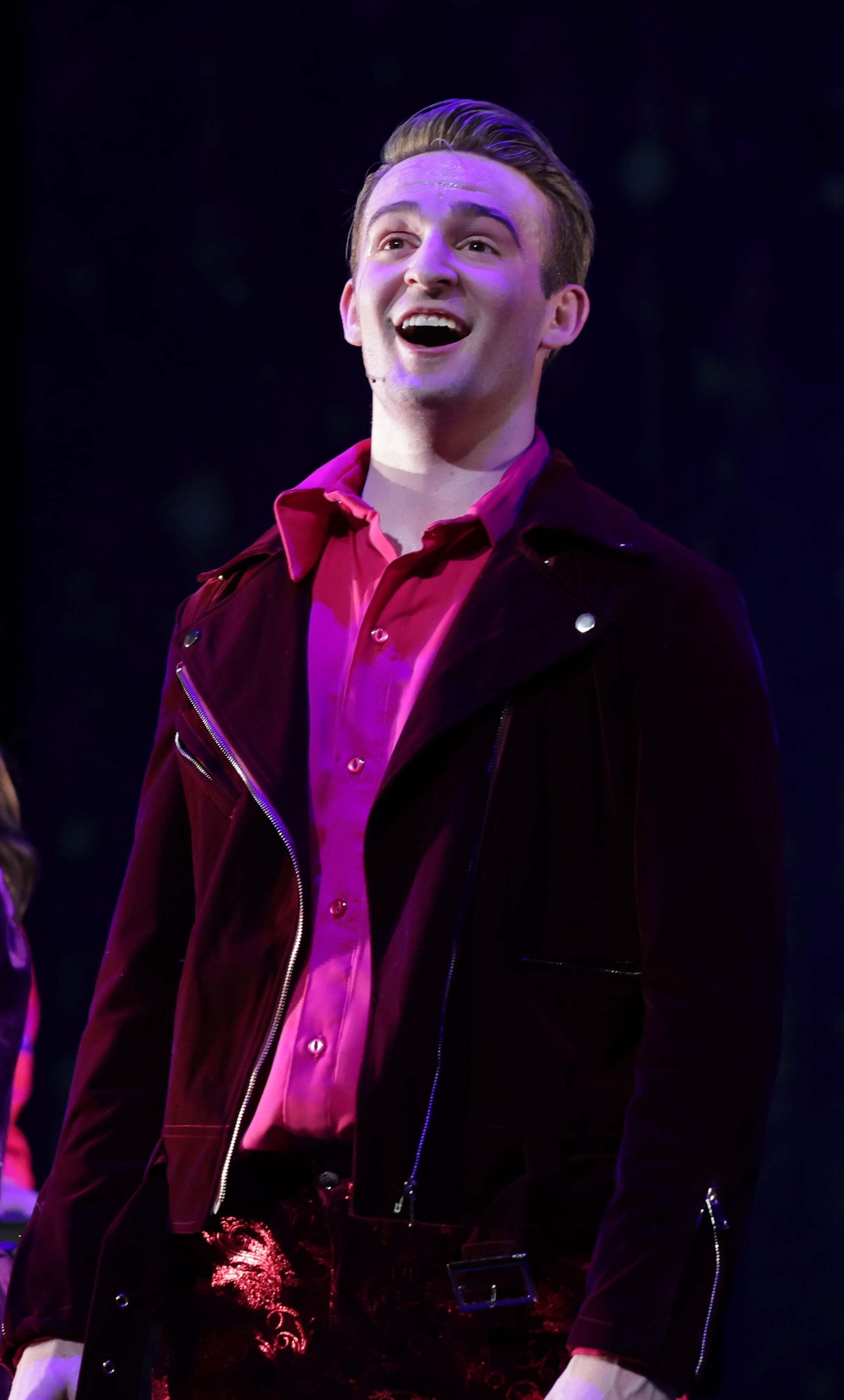 YA singing in red-min